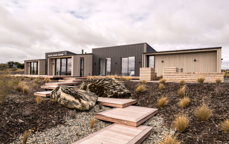 Alaskan Yellow Cedar cladding & Purpleheart decking featured at "Rocky Ridge" home in Te Anau. Designed & Built by Fabric & Te Anau Ltd. Image by Stephen Goodenough Photography.